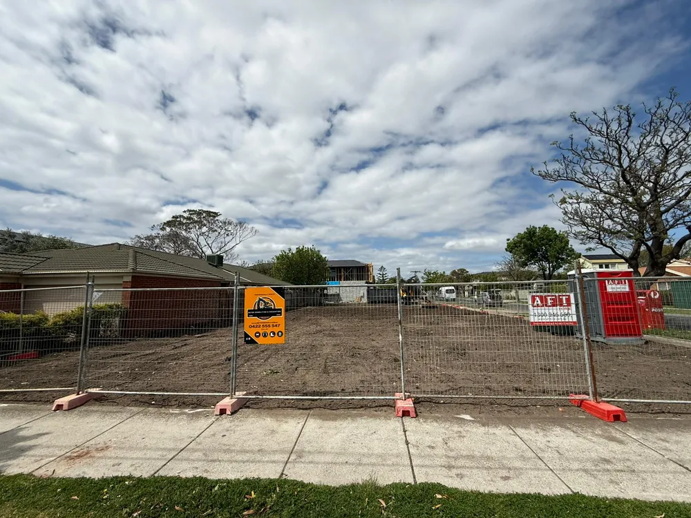 Cleared site with Metro Demolition signage